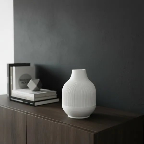 Vase with diminishing ribs