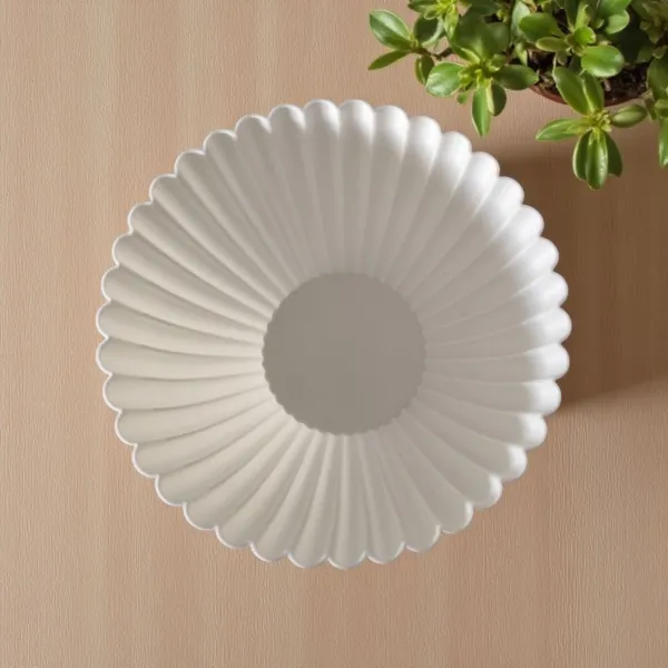 Ribbed acorn container with tealight fitting