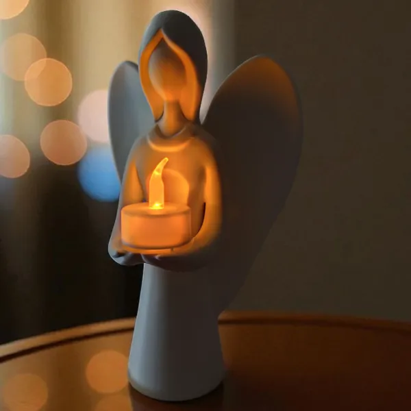 Angel holding a tealight