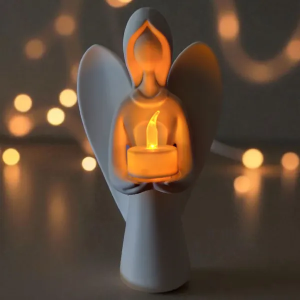 Angel holding a tealight