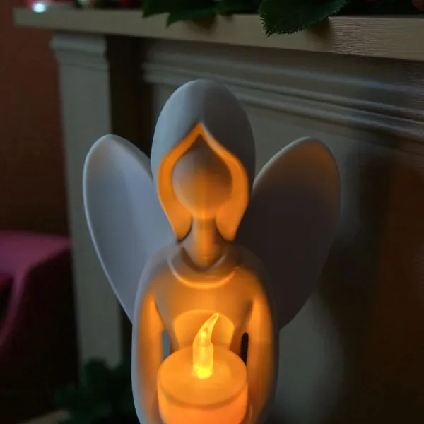 Angel holding a tealight